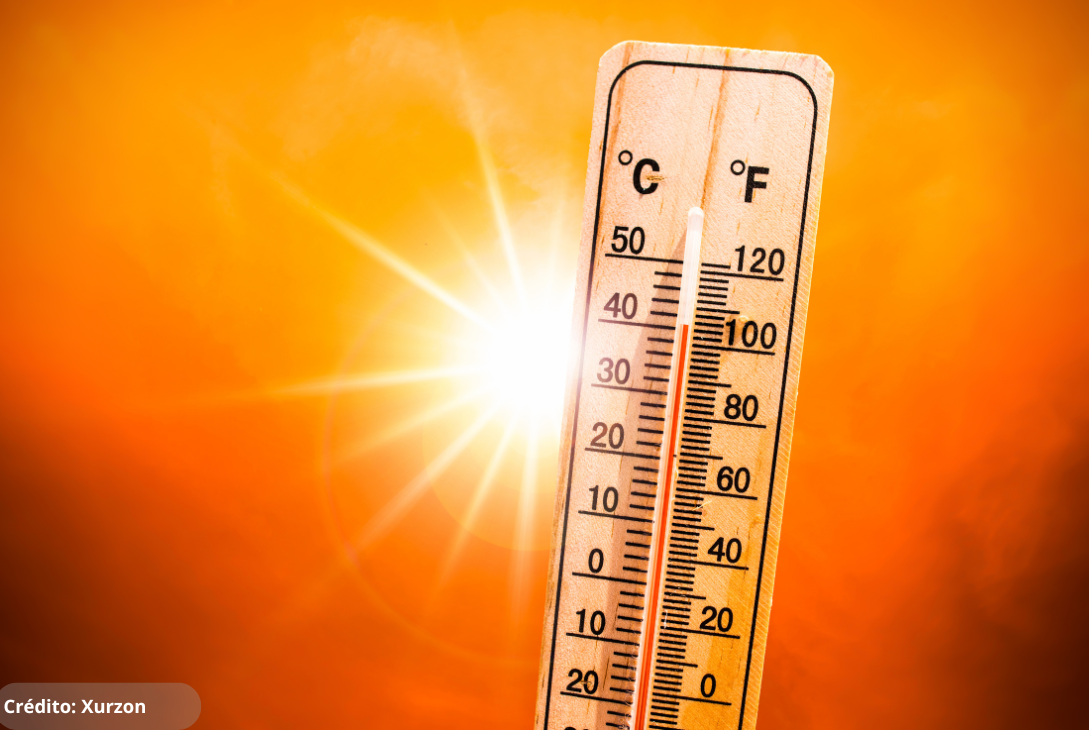 Imagem ilustrativa de um termômetro indicando alta temperatura e como ao fundo aparece um sol bem amarelo em um fundo laranja simbolizando o calor extremo.